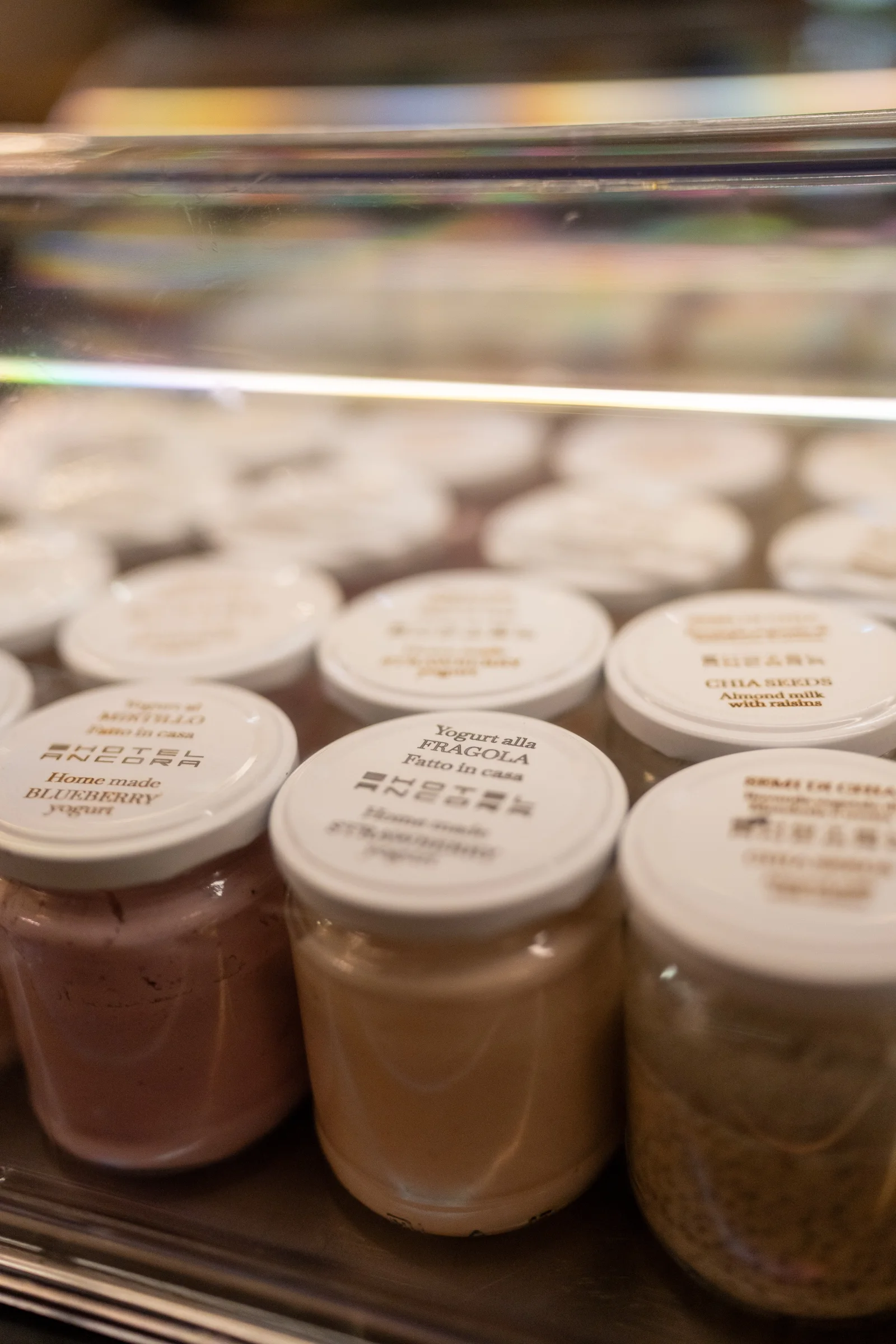 Homemade yoghurt in reusable glass jars at Hotel Ancora